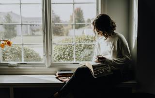 Introvert sitting in window seat