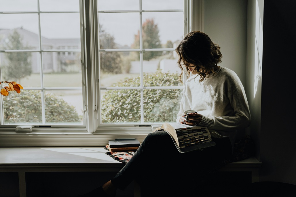 Introvert sitting in window seat